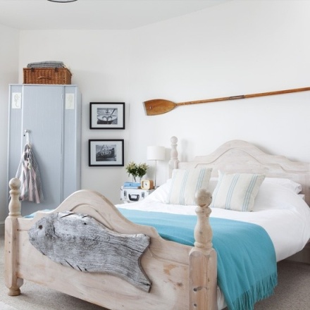 Coastal bedroom with nautical and sea inspired decor