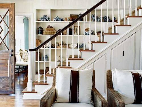 coastal living coastal staircase home built in storage stairs