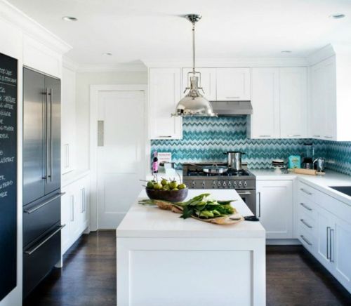 Colorful backsplash in a minimal style coastal kitchen