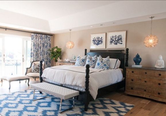 Coastal bedroom decorated in beautiful blues and whites.