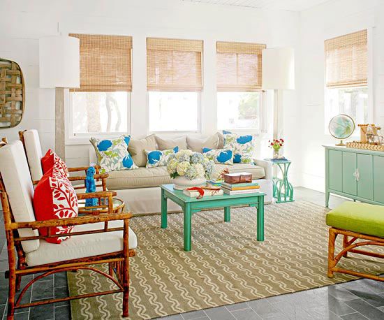A fresh, coastal living room with bright and fun acccessories