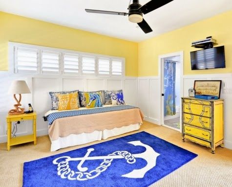 Bright and bold coastal yellows and blues in the bedroom