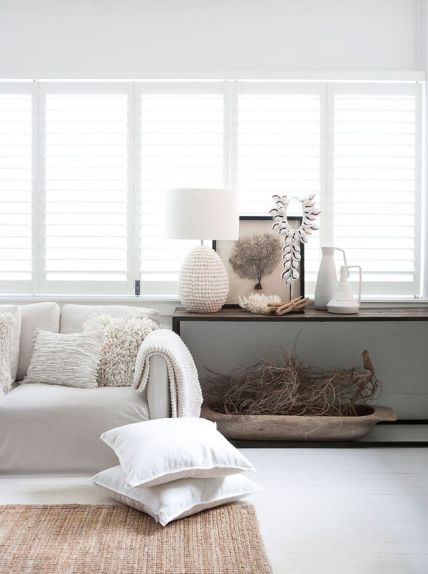 Great mix of textures using accessories in this coastal space