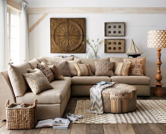 Coastal living room with great artwork and funky patterns