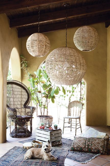 Boho chic patio area with beauitful, oversized pendant lights