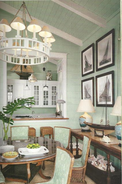 Sage colored walls, fabric and accents! Gorgeous coastal dining space!