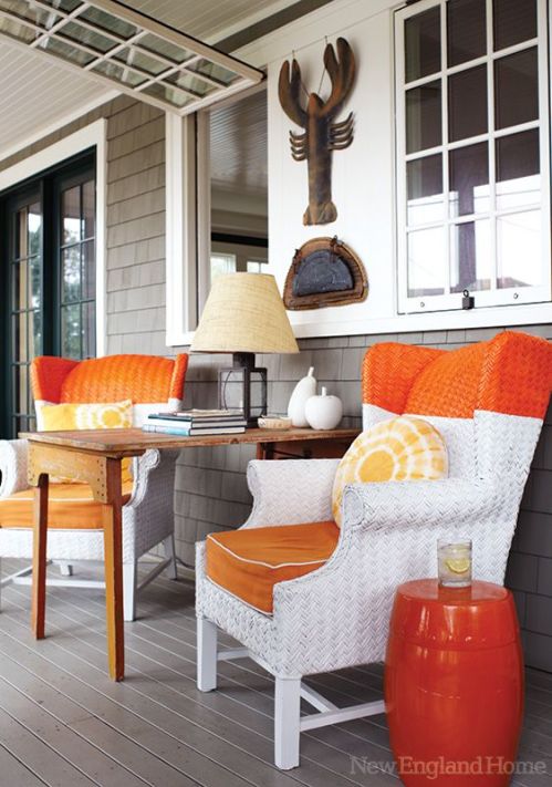 Coatsal patio furniture with chairs that have the top dipped in bright orange