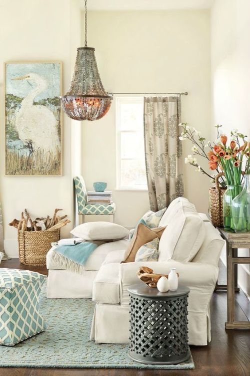 Coastal cottage with skirted sofa and rustic inspired decor