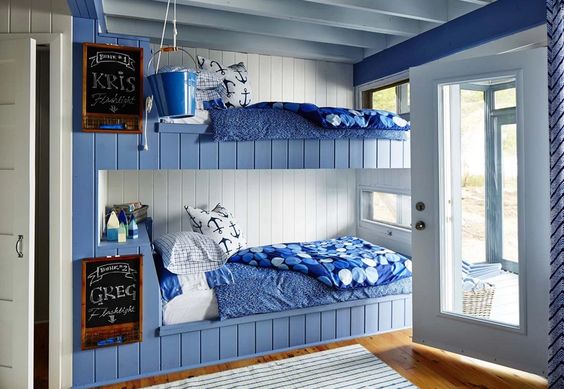 Coasatl bedroom shown with bunkbeds